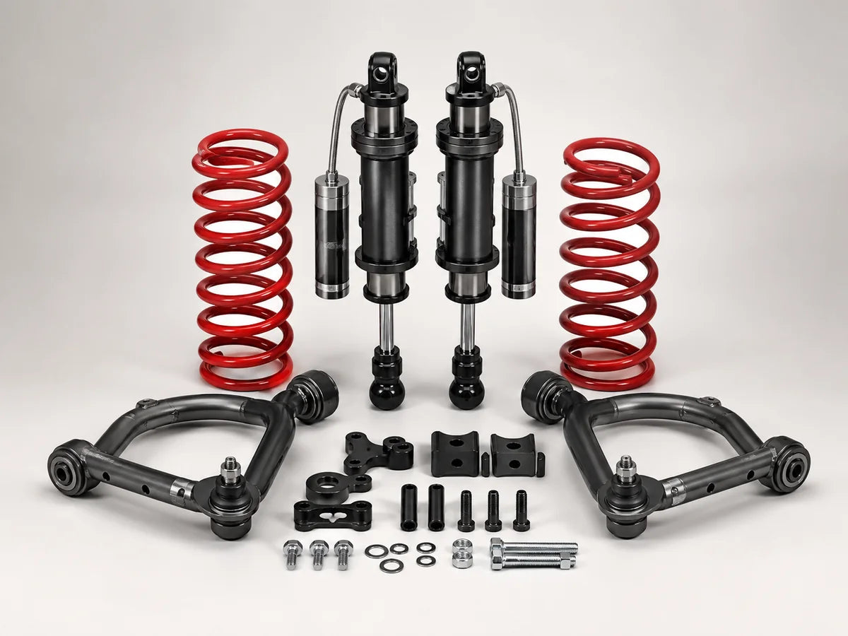 Shock absorbers, coil springs, control arms and hardware shown as a Road Rex 4x4 suspension package
