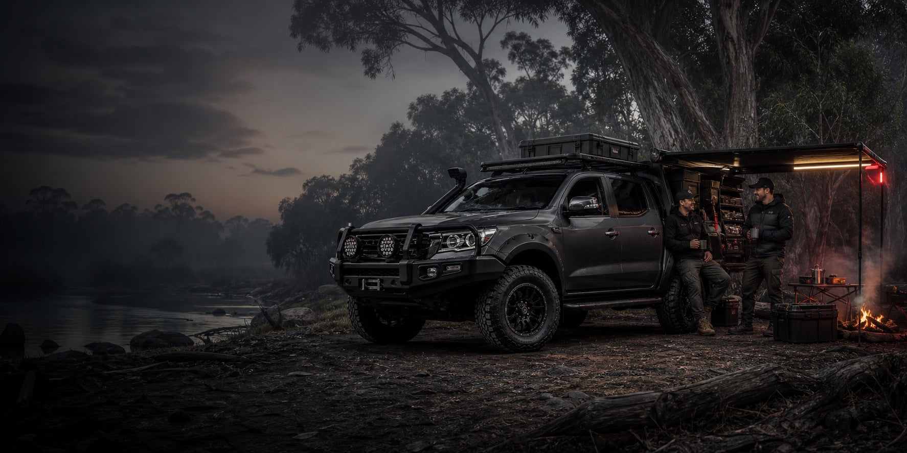 Father and adult child beside a touring-ready Road Rex 4x4 in the Australian bush